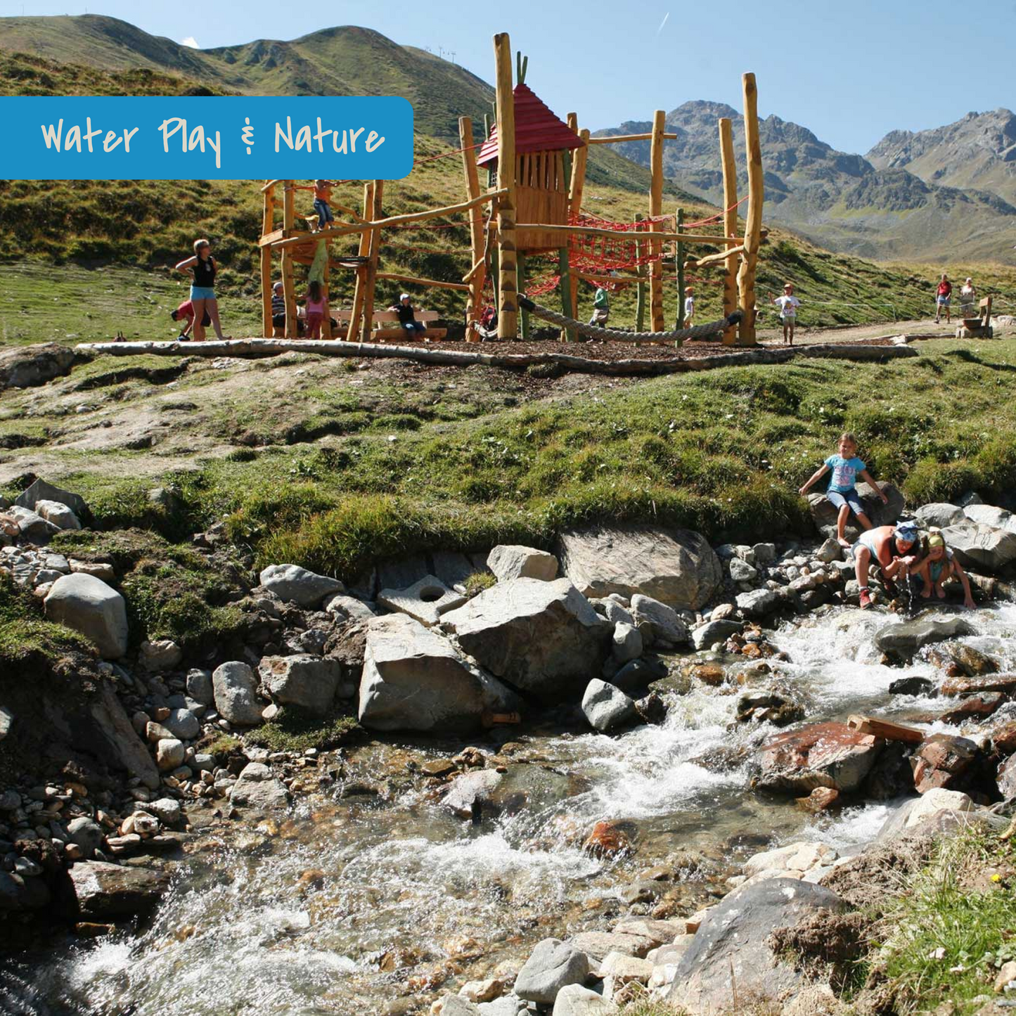 Children playing in water stream at Murmliwasser in Serfaus, Tirol, Austria.
