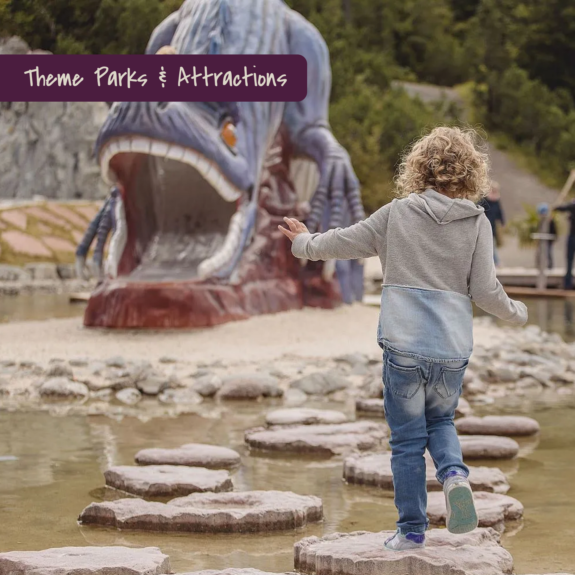 Child going oer stepping stones in water part of Triassic Park in Tirol, Asutria.